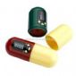 Capsule-look pill box timercan hold pills small pictures