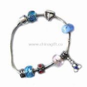 Pandora Bracelet Decorated with Metal Charms and Glazed Beads