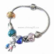 Pandora Bracelet Decorated with Metal Charms and Glazed Beads