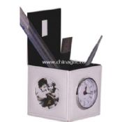 Clock with penholder