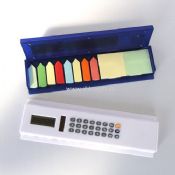 calculator with ruler and notepad