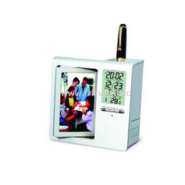 LCD alarm clock with pen holder