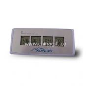 Radio controlled digital clock with calendar, alarm and temperature