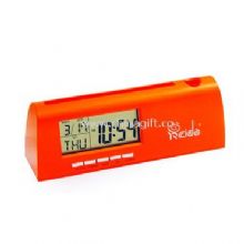 Digital clock with pencil inserted China