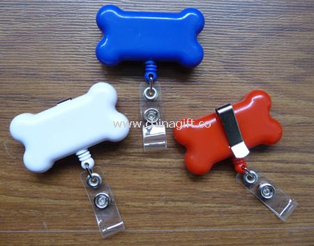 Bone shaped retractable badge holder