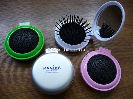 Compact mirror with comb