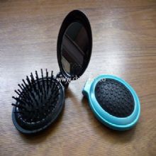 Oval shaped plastic case mirror with comb China