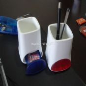 Pen holder with clip dispenser