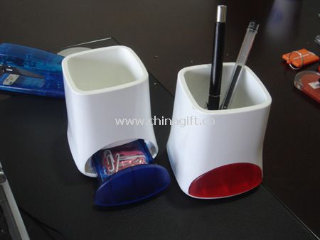 Pen holder with clip dispenser