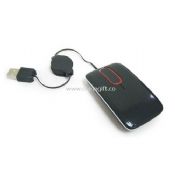Touch scrolling retractable cable mouse