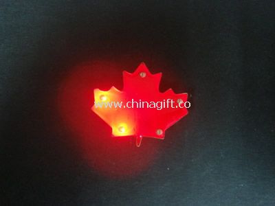 Flashing leaf shape Badge