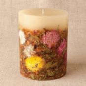 Perfume candle decorated with dried flower images