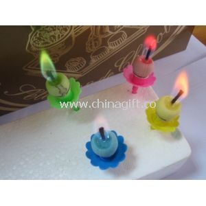 Rainbow flame birthday candle