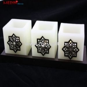 Square hollow candle holder with carved wood window
