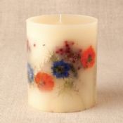 Scent candle with embedded dried flower images