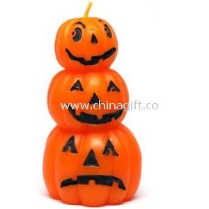 Pumpkin-shaped halloween candle