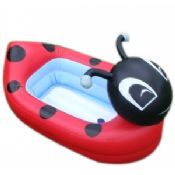 Brinquedos infláveis da água para as crianças a nadar images