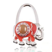 Fashion elephant shaped metal foldable bag hanger,table top bag hanger images