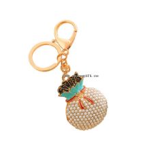 Hot sale pearl keychain best trading products purse key ring metal images