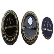 Golf cap clip with ball marker