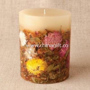 Vela de perfume decorada com flores secas