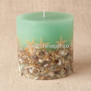 Aroma pillar candle decorate with shell