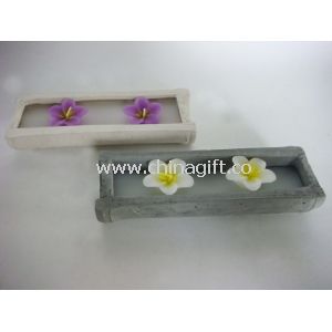 Flower candle in cement holder