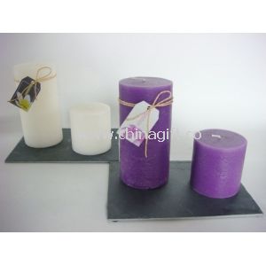 Pillar candles on slate tray