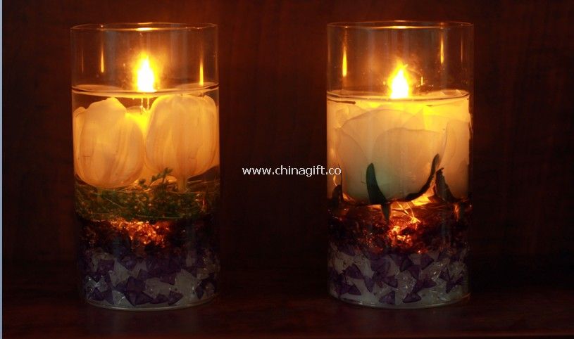 Плавающая свеча желе в стеклянной банке