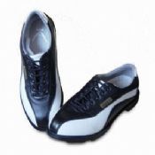 Černá a bílá profesionální golfové boty images