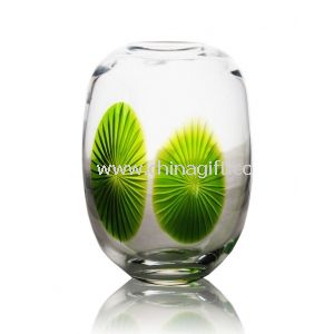 Florero de cristal decorativo transparente resistente y atractiva con hoja verde