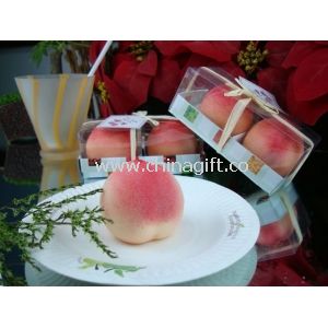 Peach fruit candle