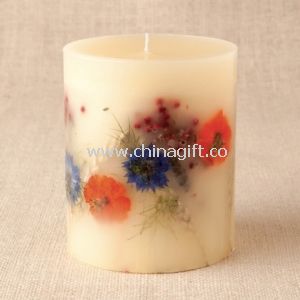 Scent candle with embedded dried flower
