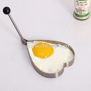 Molde huevo de acero inoxidable en forma de corazón frito
