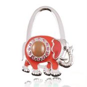 Fashion elephant shaped metal foldable bag hanger,table top bag hanger images